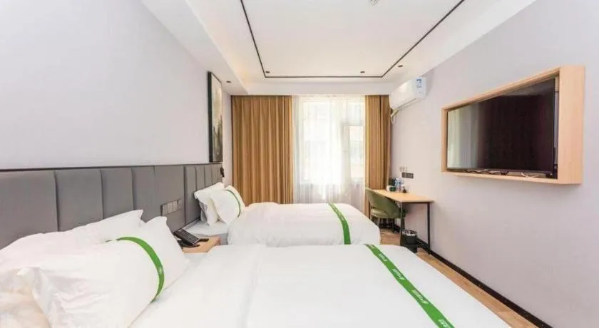 Bed in GreenTree Inn Qingdao Licang Shuyan Road Daweng Square Express Hotel