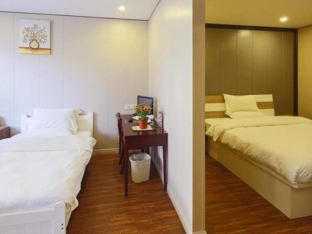 Bed in GreenTree Alliance Shanghai Railway Station QiuJiang Road Hotel