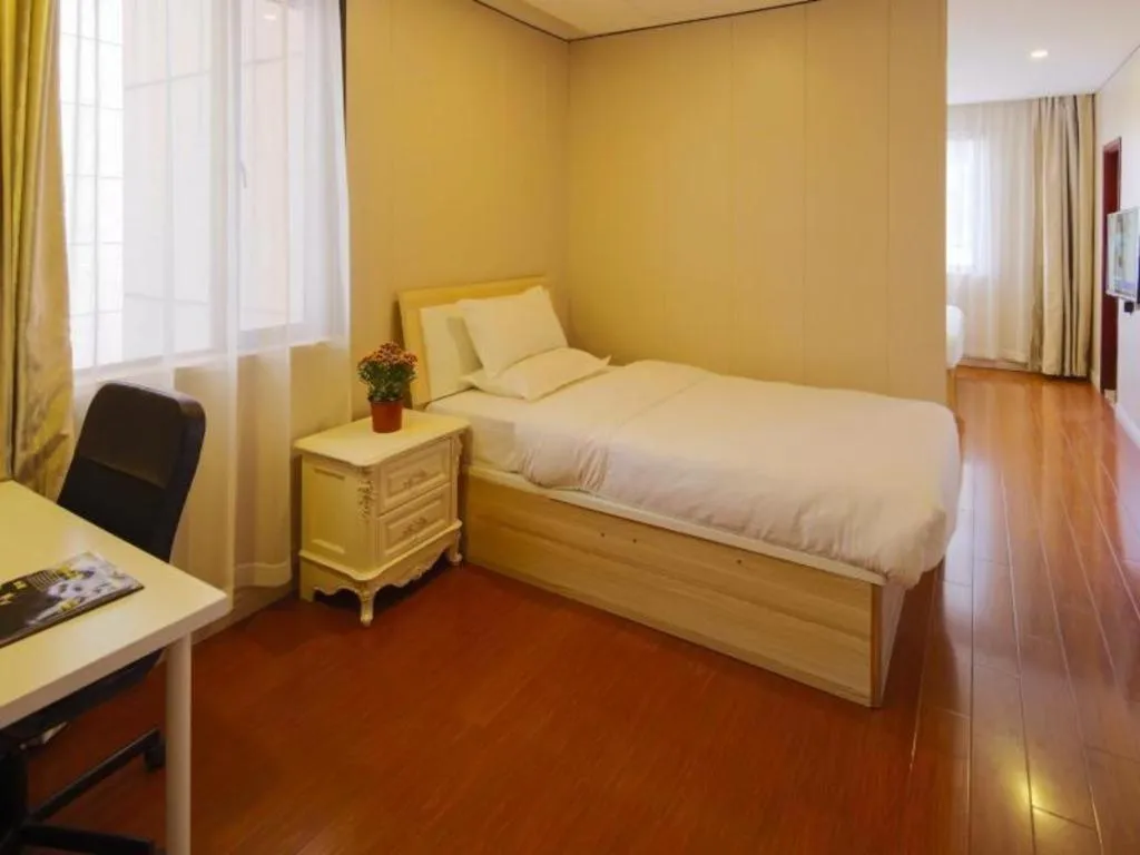 Bed in GreenTree Alliance Shanghai Railway Station QiuJiang Road Hotel