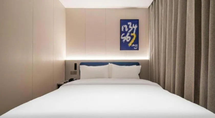 Bed in 7 Days Inn Qingdao Shandong Road Zhenning Overpass Branch