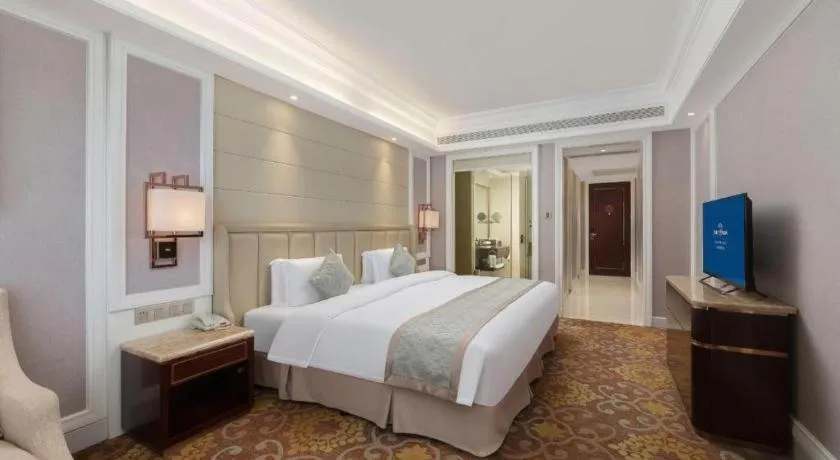 Bed in Howard Johnson Zunyue Hotel Chengdu