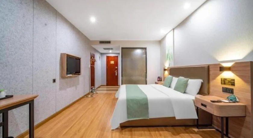 Bed in GreenTree Inn Jining Yanzhou Jiuzhou Fangyuan Business Hotel