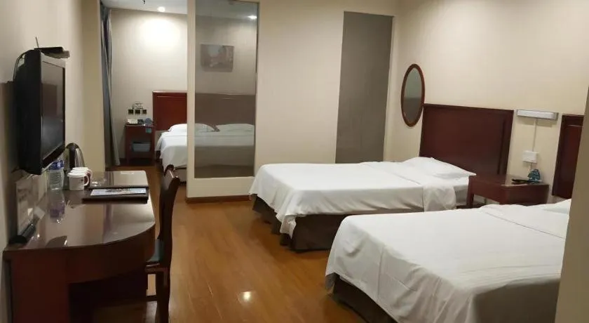 Bed in GreenTree Inn Jining Yanzhou Jiuzhou Fangyuan Business Hotel