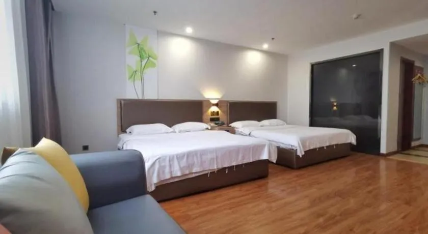 Bed in GreenTree Inn Jining Yanzhou Jiuzhou Fangyuan Business Hotel