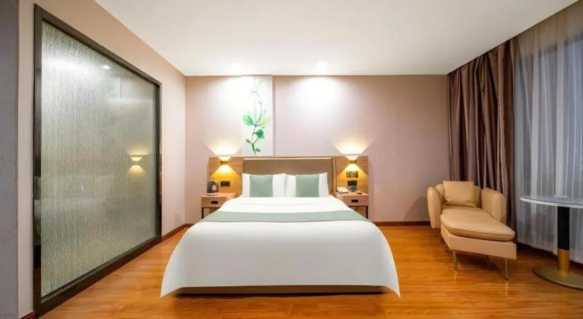 Bed in GreenTree Inn Jining Yanzhou Jiuzhou Fangyuan Business Hotel