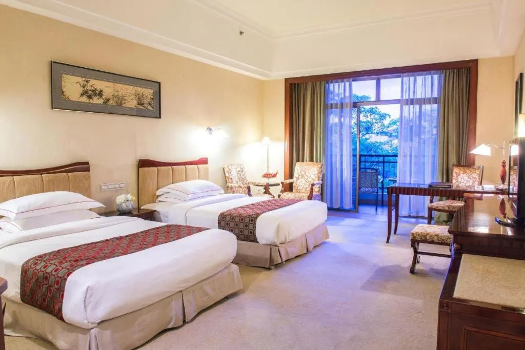 Bed in Country Garden Phoenix Hotel Maoming