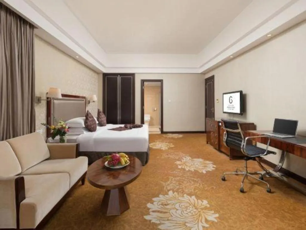 Bed in Country Garden Phoenix Hotel Maoming