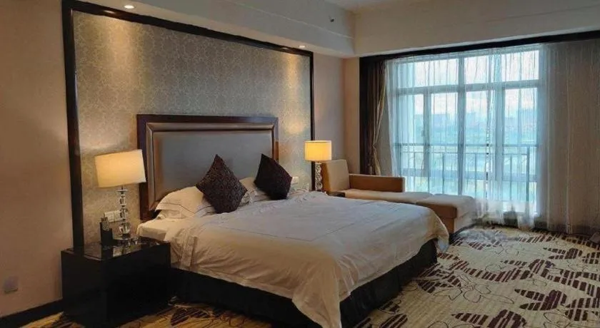 Bed in Country Garden Phoenix Hotel Maoming