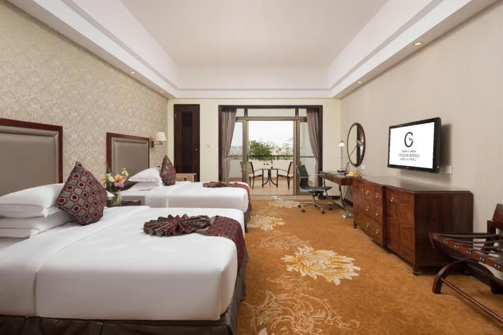 Bed in Country Garden Phoenix Hotel Maoming