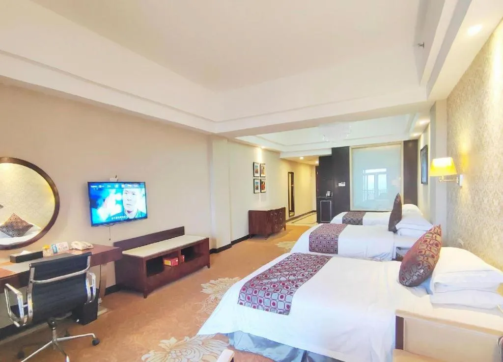 Bed in Country Garden Phoenix Hotel Maoming