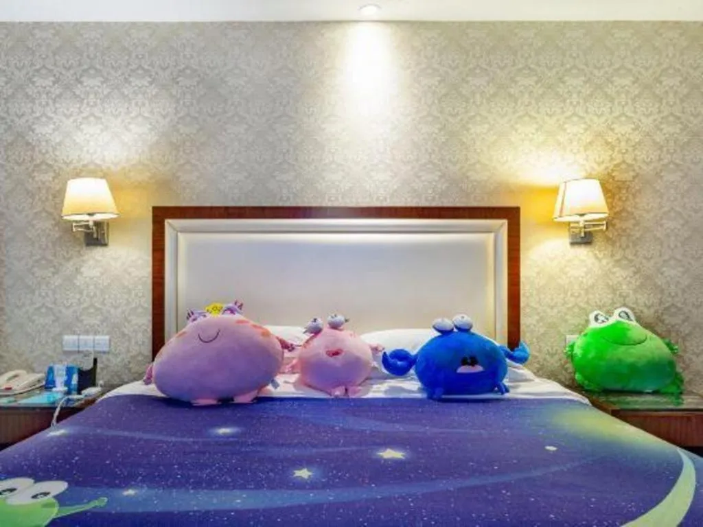 Bed in Country Garden Phoenix Hotel Maoming