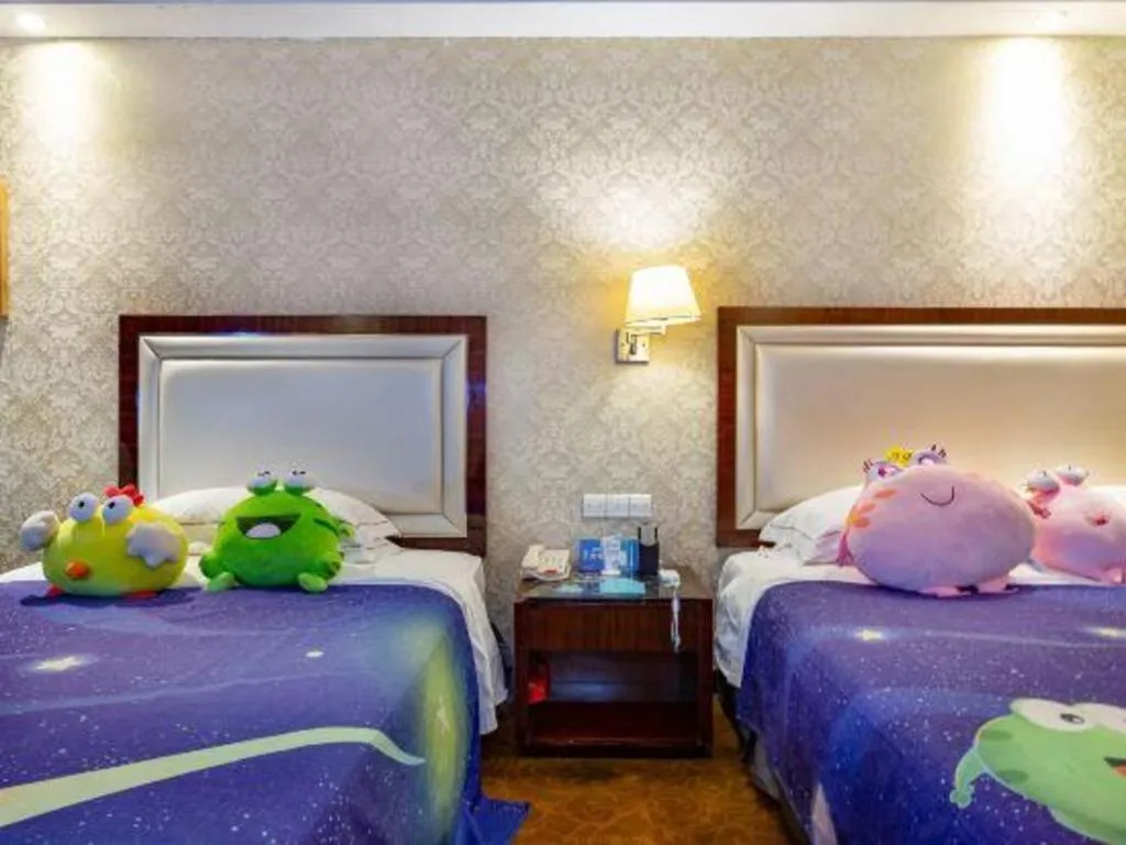 Bed in Country Garden Phoenix Hotel Maoming