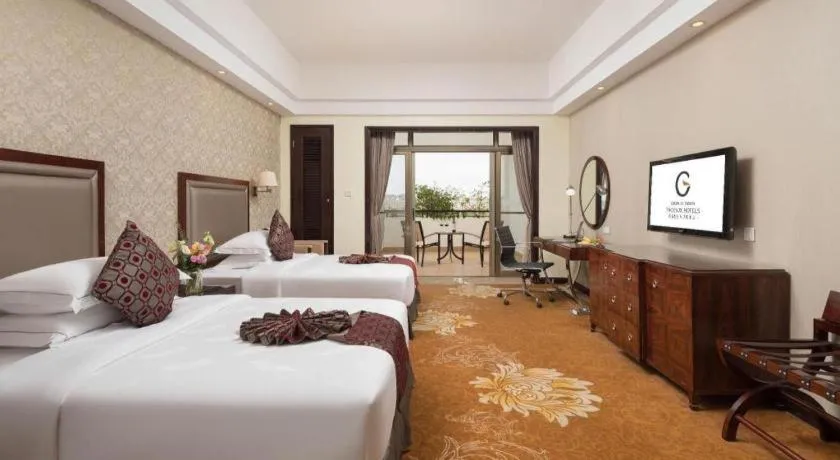 Bed in Country Garden Phoenix Hotel Maoming