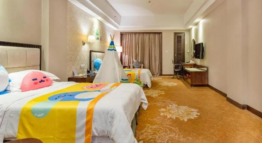 Bed in Country Garden Phoenix Hotel Maoming