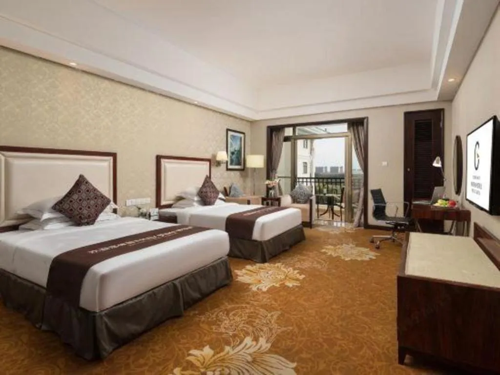 Bed in Country Garden Phoenix Hotel Maoming