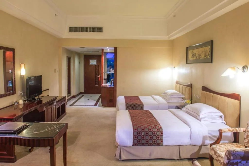 Bed in Country Garden Phoenix Hotel Maoming