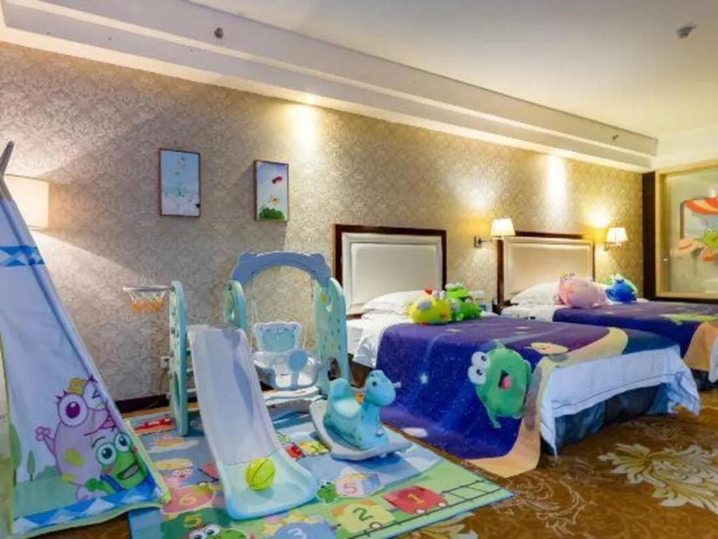 Bed in Country Garden Phoenix Hotel Maoming