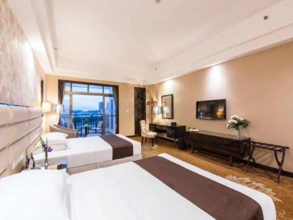 Bed in Country Garden Phoenix Hotel Maoming