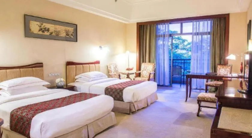 Bed in Country Garden Phoenix Hotel Maoming