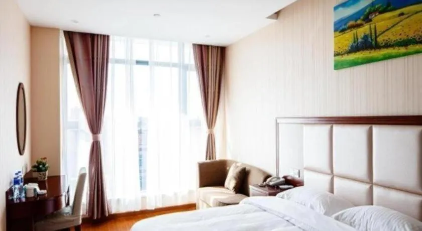 Bed in GreenTree Inn Jiangsu Zhangjiagang Jingang Town Darunfa Express Hotel