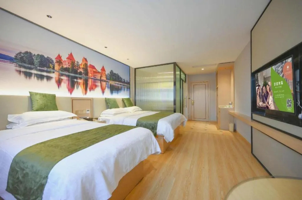 Bed in GreenTree Inn Jiangsu Zhangjiagang Jingang Town Darunfa Express Hotel