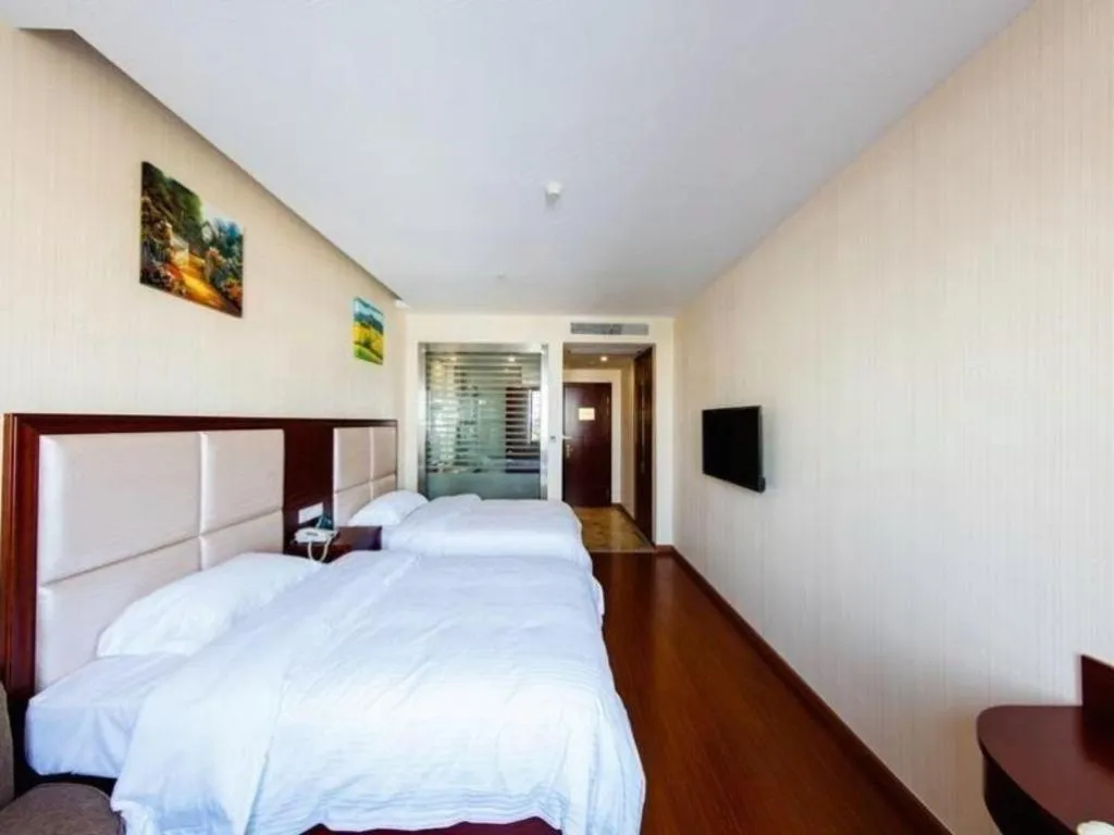 Bed in GreenTree Inn Jiangsu Zhangjiagang Jingang Town Darunfa Express Hotel