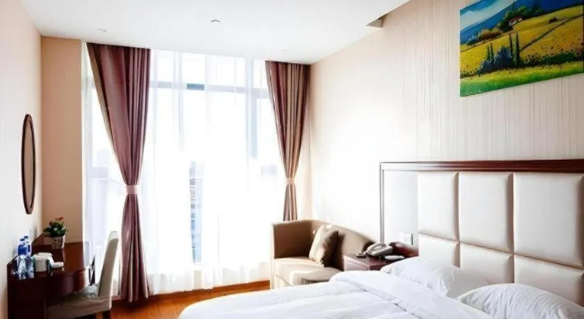 Bed in GreenTree Inn Jiangsu Zhangjiagang Jingang Town Darunfa Express Hotel