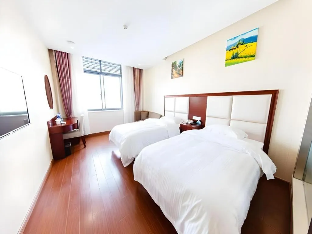 Bed in GreenTree Inn Jiangsu Zhangjiagang Jingang Town Darunfa Express Hotel