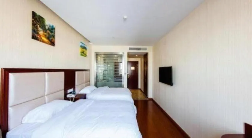 Bed in GreenTree Inn Jiangsu Zhangjiagang Jingang Town Darunfa Express Hotel