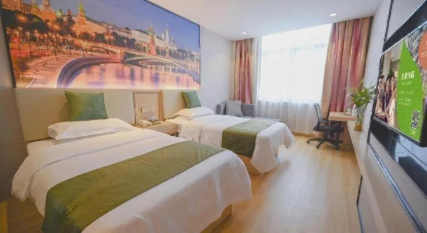 Bed in GreenTree Inn Jiangsu Zhangjiagang Jingang Town Darunfa Express Hotel