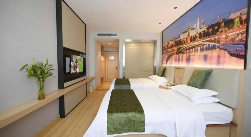 Bed in GreenTree Inn Jiangsu Zhangjiagang Jingang Town Darunfa Express Hotel