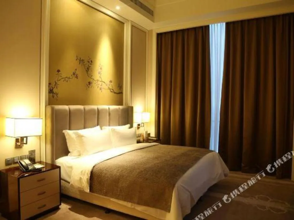 Bed in Ming Du Lakeside Hotel Nanning