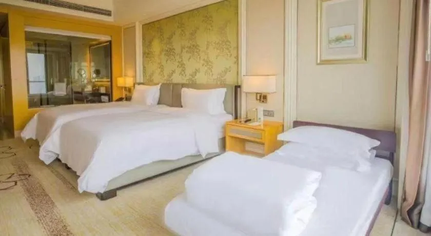 Bed in Ming Du Lakeside Hotel Nanning