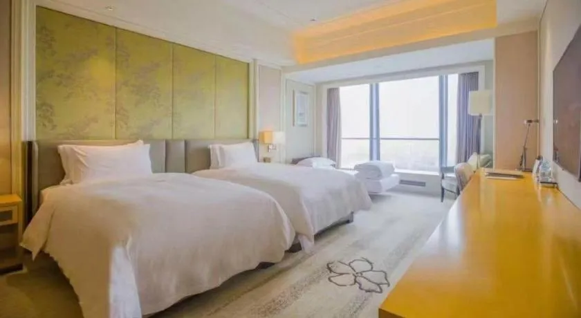 Bed in Ming Du Lakeside Hotel Nanning