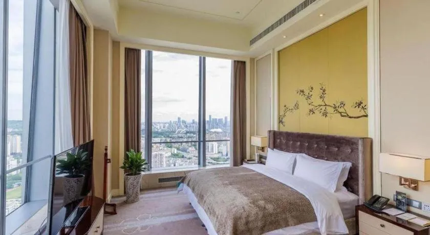 Bed in Ming Du Lakeside Hotel Nanning