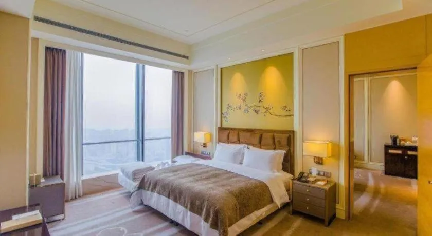 Bed in Ming Du Lakeside Hotel Nanning