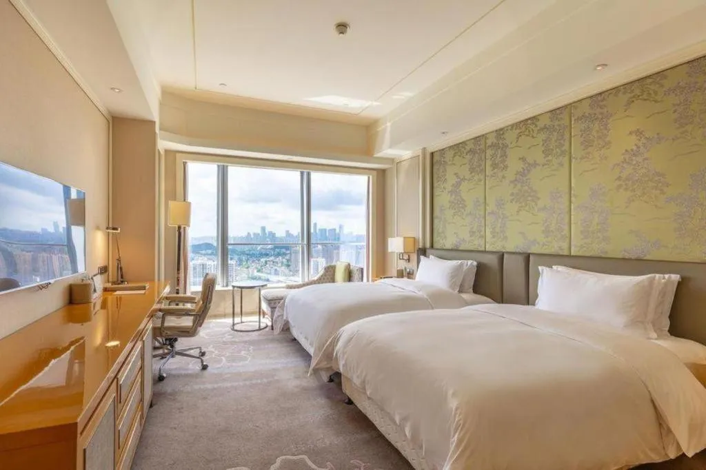 Bed in Ming Du Lakeside Hotel Nanning