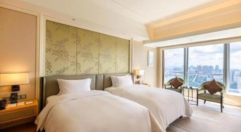 Bed in Ming Du Lakeside Hotel Nanning