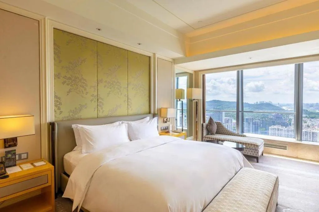 Bed in Ming Du Lakeside Hotel Nanning