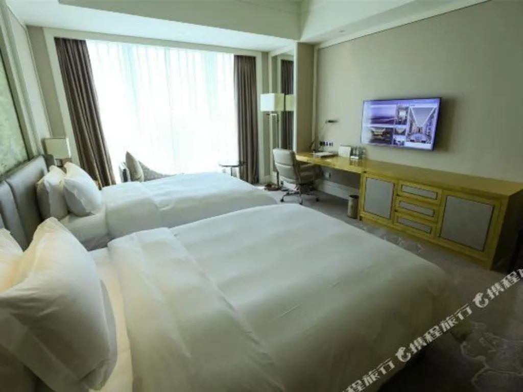 Bed in Ming Du Lakeside Hotel Nanning