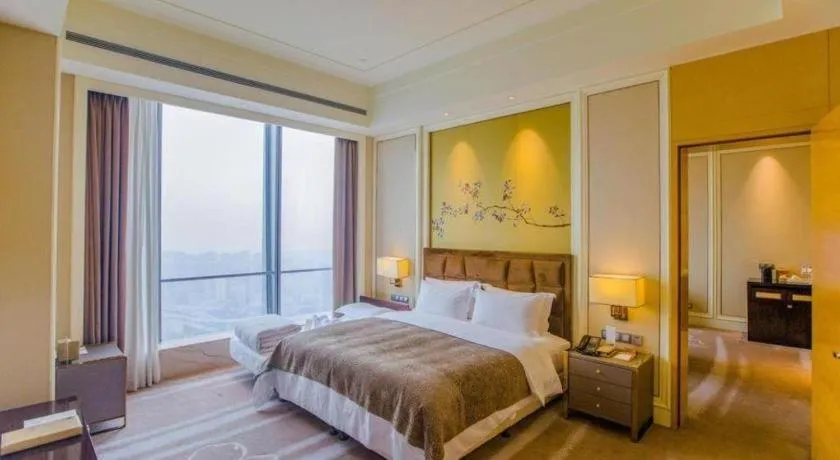 Bed in Ming Du Lakeside Hotel Nanning