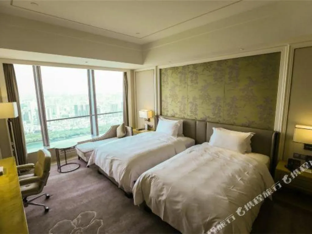 Bed in Ming Du Lakeside Hotel Nanning