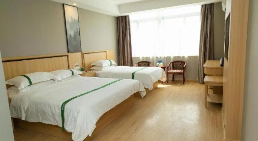 Bed in GreenTree Inn Jiansu Nantong Tongzhouwan Huanghe Road Business Hotel