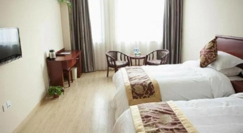 Bed in GreenTree Inn Jiansu Nantong Tongzhouwan Huanghe Road Business Hotel
