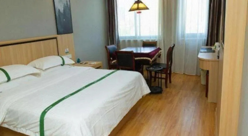 Bed in GreenTree Inn Jiansu Nantong Tongzhouwan Huanghe Road Business Hotel