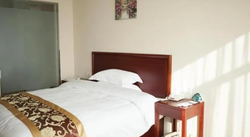 Bed in GreenTree Inn Jiansu Nantong Tongzhouwan Huanghe Road Business Hotel