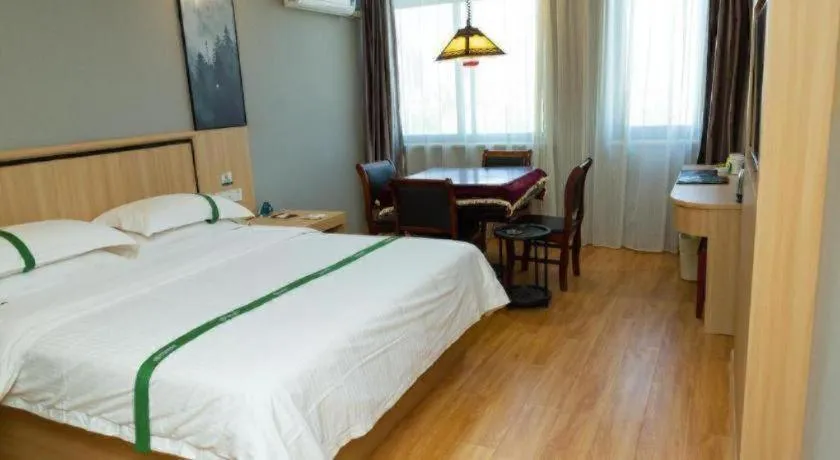 Bed in GreenTree Inn Jiansu Nantong Tongzhouwan Huanghe Road Business Hotel
