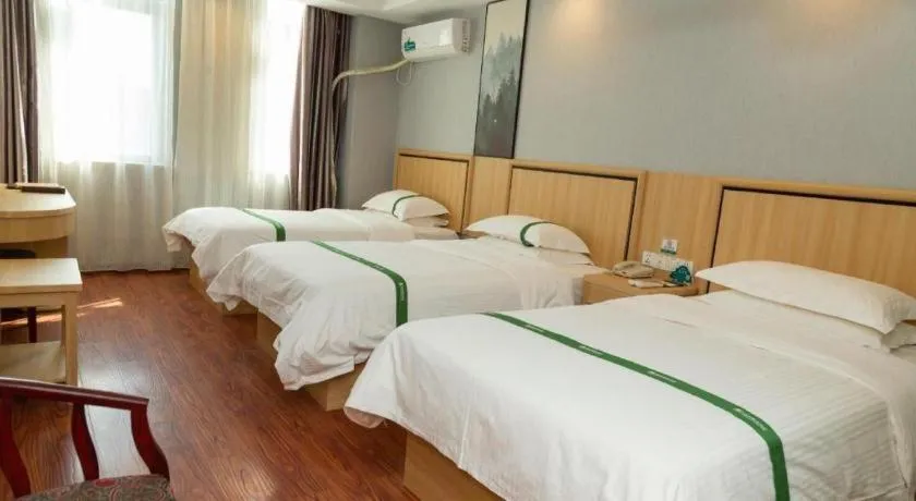 Bed in GreenTree Inn Jiansu Nantong Tongzhouwan Huanghe Road Business Hotel