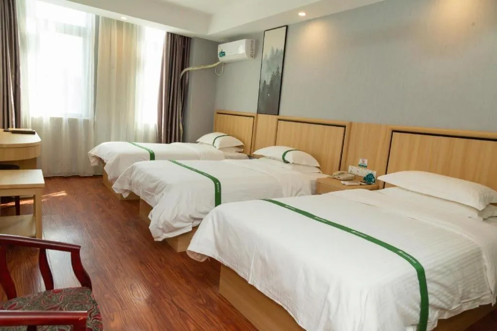 Bed in GreenTree Inn Jiansu Nantong Tongzhouwan Huanghe Road Business Hotel