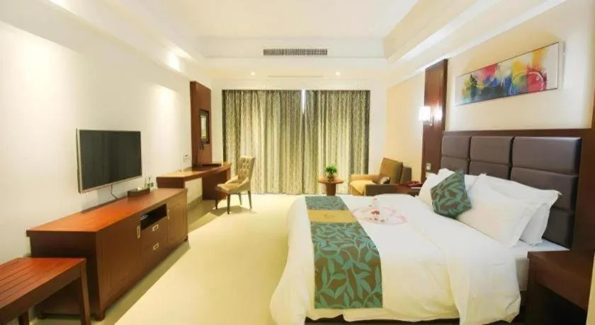 Bed in Qionghai Jin Mao Hotel